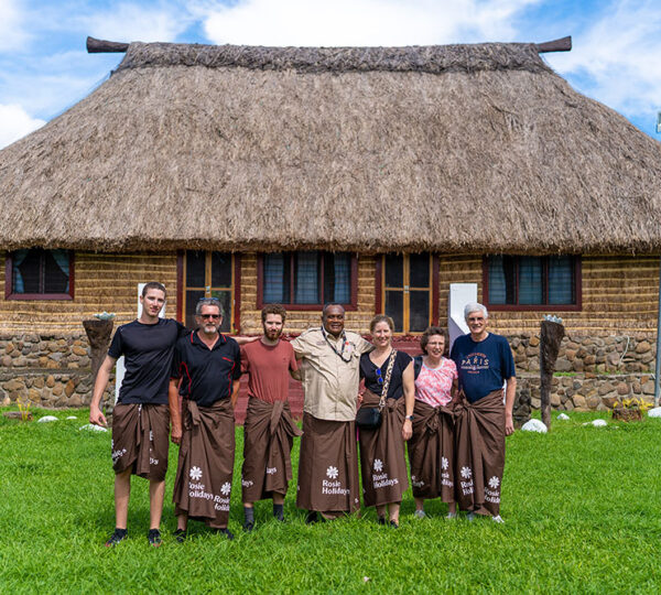 Villagers in traditional dress welcoming visitors at Koroiaca village in Sabeto, Fiji